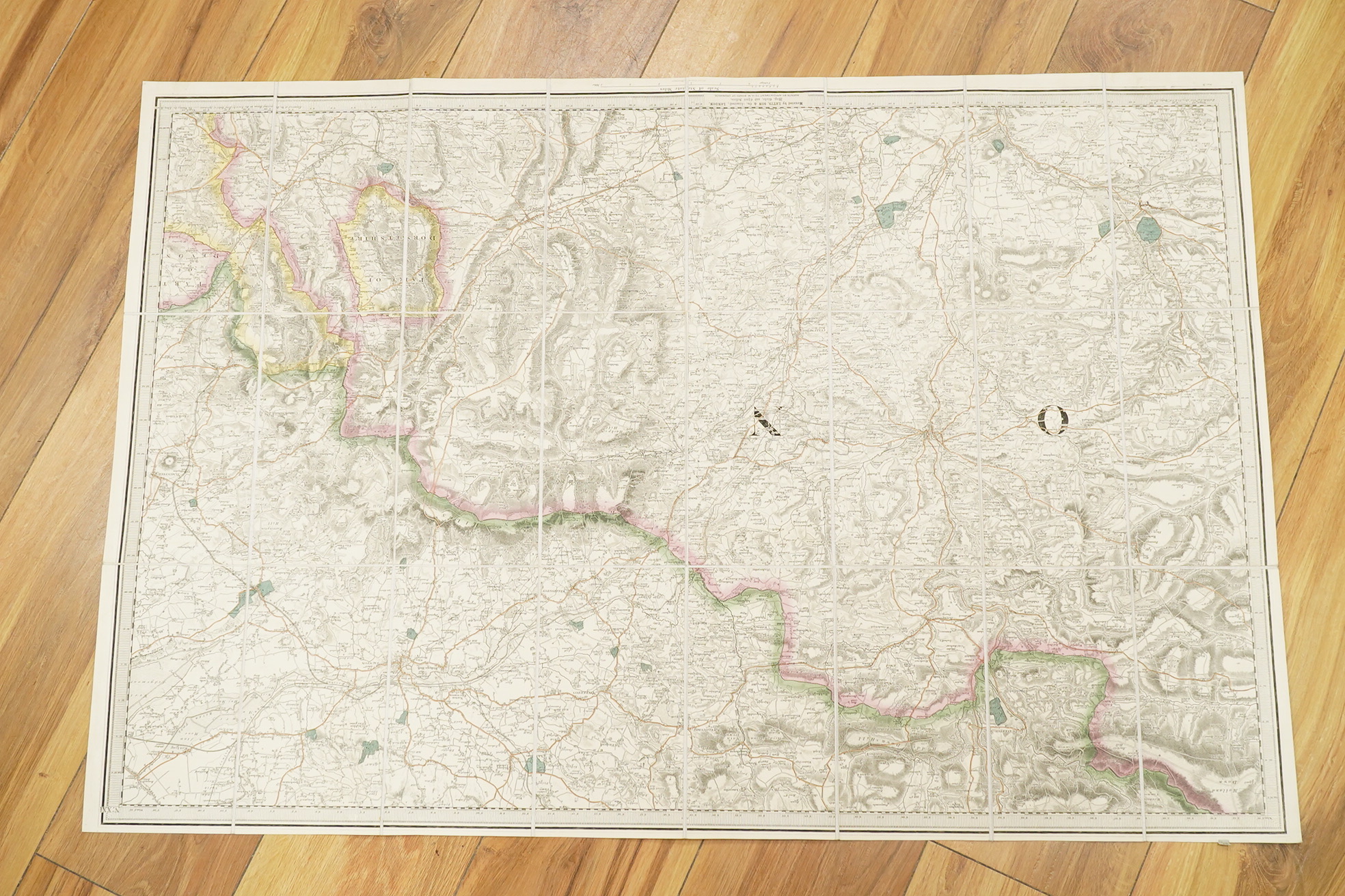 Devon, Ordnance Survey maps, c.1860s, comprising of a set of seven engraved maps mounted on linen covering Devon, sheet no.s; 21, 22, 23, 24, 25, 26 and 27, engraved by Benjamin Baker, and published by the Ordnance Surve
